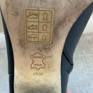 Rarely worn booties with Tory Burch logo on heel